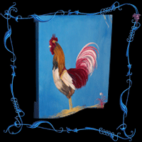 Coq sur meuble de four